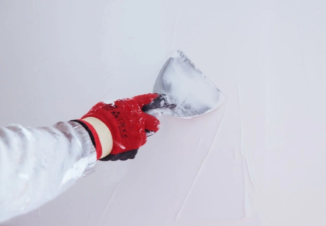 Enhance Your Exterior Walls with Textured Wall Putty apply primer firstly